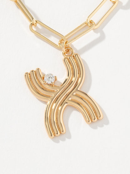 ["Muse Initial Layered Necklace ", " Gold X ", " Product Image ", " Uncommon James"]