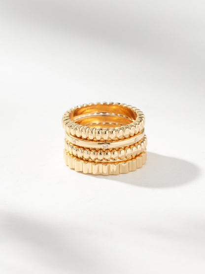 ["High Tide Ring Stack (Set of 4) ", " Gold ", " Product Image ", " Uncommon James"]
