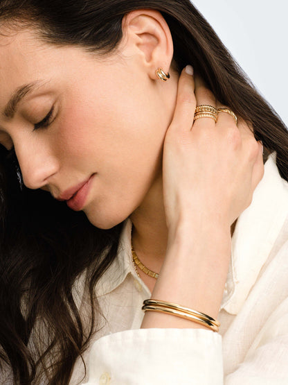 ["High Tide Ring Stack (Set of 4) ", " Gold ", " Model Image ", " Uncommon James"]
