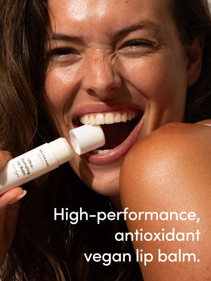 ["Ultra Hydrating Lip Balm ", " Mango / .56 OZ ", " Model Image ", " Uncommon Beauty"]