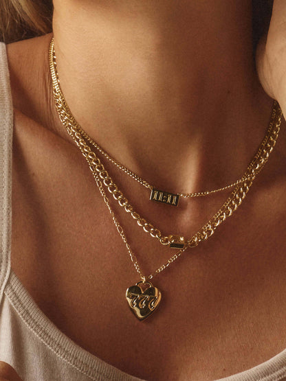 ["Lucky Girl Necklace Stack ", " Gold ", " Campaign Image ", " Uncommon James"]