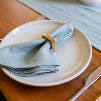 ["Napkin Rings Set of 4 ", " Gold ", " Lifestyle Image ", " Uncommon James Home"]