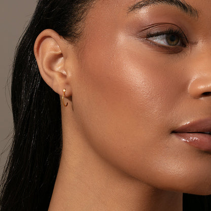 ["Luxurious Touch Vermeil Hoop Earrings ", " Gold Vermeil ", " Model Image ", " Uncommon James"]