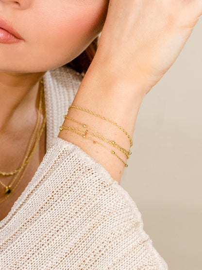 ["Double Chain Vermeil Bracelet Set ", " Gold Vermeil ", " Campaign Image ", " Uncommon James"]