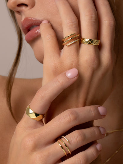 ["Vermeil Minimal Glam Spiral Ring ", " Gold Vermeil ", " Campaign Image ", " Uncommon James"]