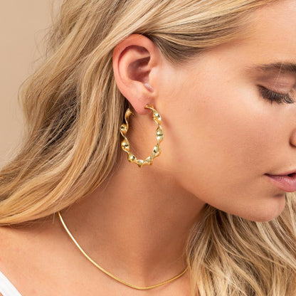 ["WITH A TWIST HOOPS"]